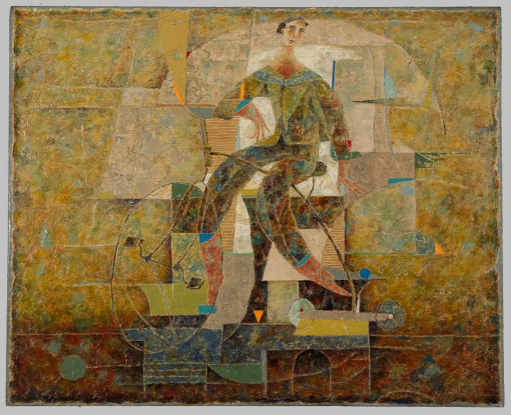 Un homme est assis sur un tricycle. Pourtant, c